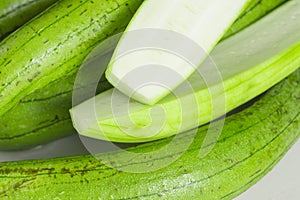 Stack of fresh organic luffa squash