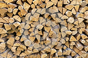 A stack of freshly cut firewood, prepared for the winter