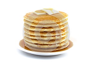 Stack of Freshly Made Pancakes with Syrup and Butter Isoalted on a White Background