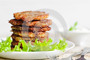 Stack of fried potato pancakes