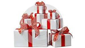 Stack of gift boxes with red ribbons isolated on white background