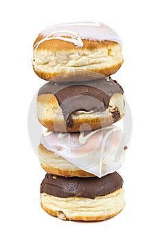 Stack of glazed and chocolate donuts