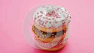 Stack of glazed sweet doughnuts