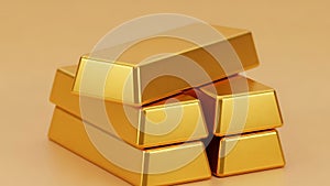 Stack of gold bars on orange background