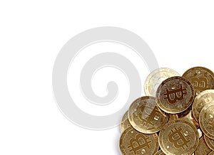 Stack of golden Bitcoins in bottom-right corner isolated on white and copy space for your text.