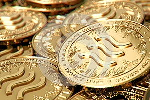 Stack of golden Libra cryptocurrency concept coins in blurry closeup. 3D rendering