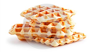 Stack of golden waffles dusted with sugar on a white background