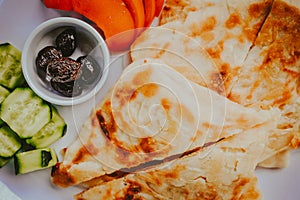 Stack of gozleme on the plate