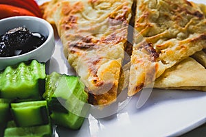 Stack of gozleme on the plate