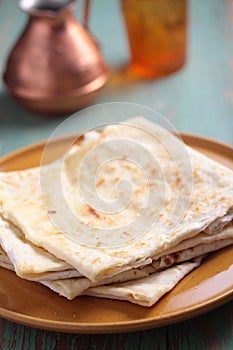 Stack of gozleme on a plate
