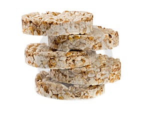 Stack of grain crispbreads isolated on white background