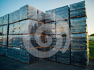 Stack of gray bricks packs on new construction site