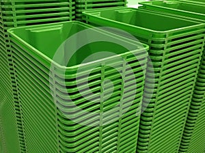 Stack of green color plastic baskets