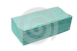 Stack of green paper towels isolated on white background.