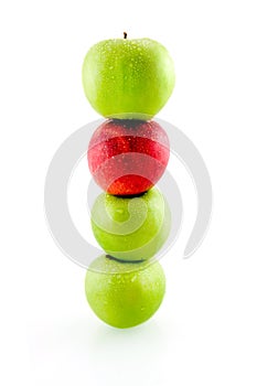 Stack of green and red apples