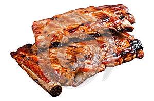 Stack of grilled pork ribs in BBQ sauce on a chopping board. Isolated, white background.