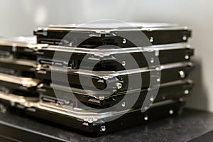 Stack of hard drives for data storage data center close-up