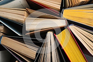 Stack of hardcover books as background