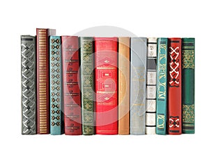 Stack of hardcover books on white