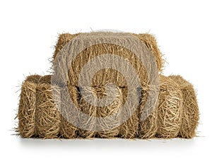 Stack of hay bales isolated on white background