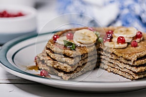 Stack of healthy low carbs oat pancakes photo