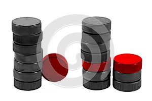 Stack of hockey pucks