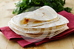 Stack of homemade whole wheat flour tortillas photo