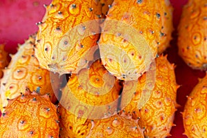 Stack of horned melons on a market stall