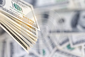 Stack of hundred dollar bills, banknotes of hundred, closeup