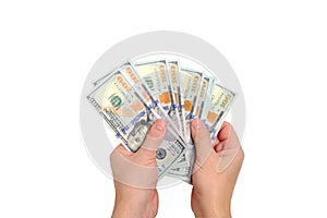Stack hundred dollar bills hands, on white background