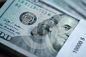 10000$ stack of hundred dollar bills