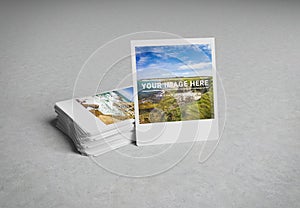 Stack of instant photos on concrete surface 3D rendering