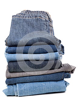 Stack of jeans isolated on white background