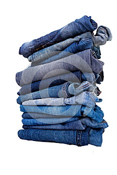 Stack of jeans isolated on white background
