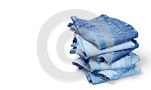 Stack jeans on white background