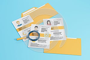 Stack of job applications with folders and magnifying glass