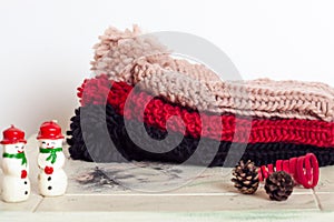 Stack of knitted hats on a table