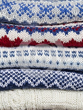 Stack of knitted sweaters