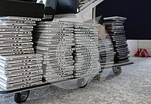 Stack of laptops in the storage room