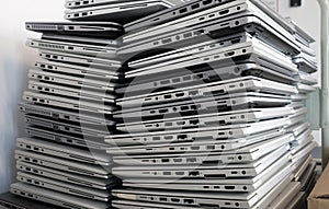 Stack of laptops to be discarded