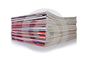 The stack of magazine isolated on the white background