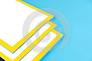 Stack magazines on blue background