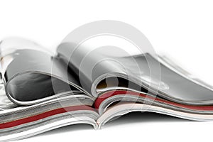 Stack of magazines on isolated white