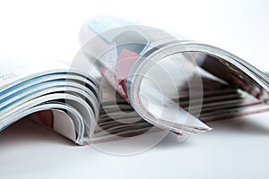 Stack of magazines on the table