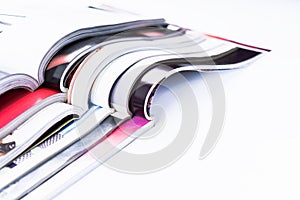 Stack of magazines on white background or isolated