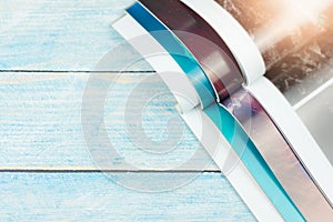 Stack magazines on wooden table