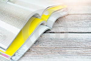Stack magazines on wooden table