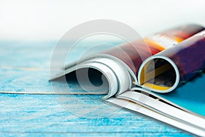 Stack magazines on wooden table