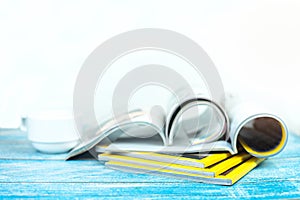 Stack magazines on wooden table