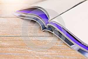 Stack magazines on wooden table